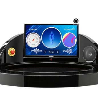 Futuristic medical scanner console on a glossy circular pedestal, showing a wide touchscreen with a blue body diagram, a gauge, and circular graphics, plus a small camera nearby.