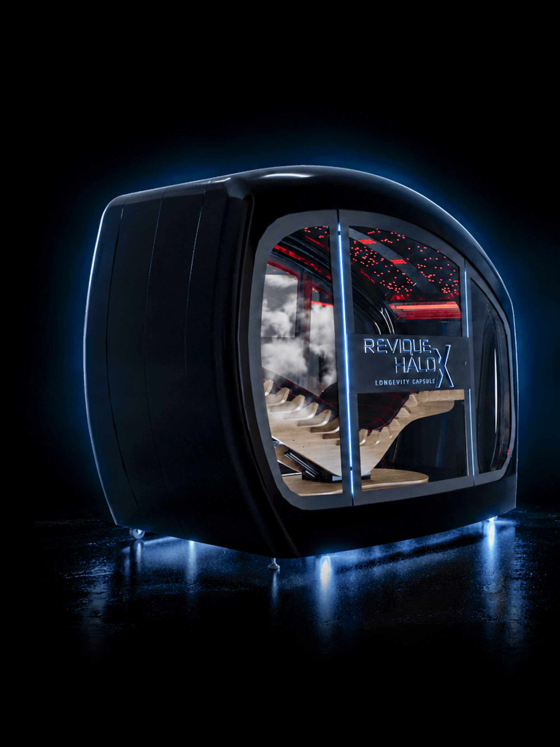 Carcasă de calculator neagră, futuristă, cu fereastră de sticlă curbată, contur albastru strălucitor și componente interioare iluminate în roșu. Textul 'Rev... Halo X' este pe panou.