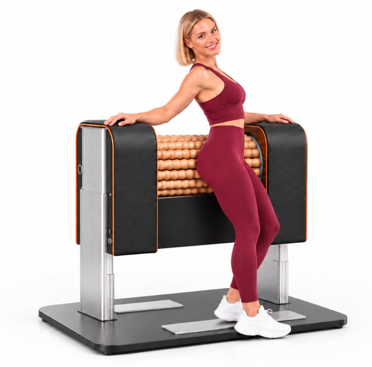 Woman in maroon workout outfit using a roller-based exercise machine, standing with hands on padded rails and feet on a platform.